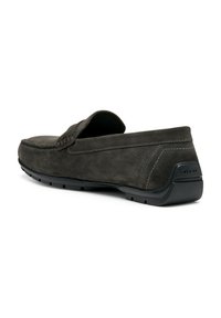 Ciemnoszare zamszowe buty wsuwane z zaokrąglonym noskiem, płaską czarną gumową podeszwą i kontrastującymi detalami stębnowania. Posiadają wyściełaną wkładkę.