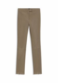 Beige stretch pants with a slim fit, featuring a smooth texture, zippered ankle details, and a mid-rise waistband.