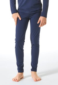 Dark navy leggings made of soft, stretchy fabric, featuring a seamless design with a snug fit and no visible hardware or accents.