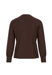 Top marrone a maniche lunghe con scollo rotondo, corpo aderente e maniche arricciate. Realizzato in un tessuto liscio e strutturato, di colore uniforme.