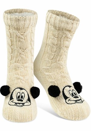 Calze lavorate a maglia color crema con un motivo a trecce; presenta la faccia nera di Topolino e due pompon neri sulle punte. Materiale morbido e testurizzato.