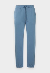 Ανοιχτό μπλε παντελόνι jogger από απαλό ύφασμα, με ελαστική μέση και κορδόνι, πλαϊνές τσέπες και ελαστικά μανσέτες στους αστραγάλους.