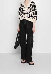 Monki Kofta - black