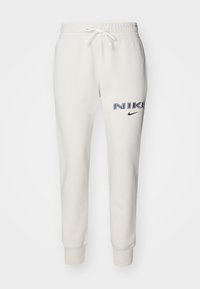 LOGO - Pantaloni sportivi - light orewood brown