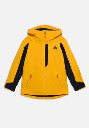 Veste à capuche Burton jaune avec panneaux noirs sur les manches, fermeture éclair frontale, poche poitrine et deux poches mains zippées.