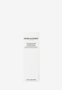 White rectangular box featuring "GROWN ALCHEMIST" and product details in black text. Contains age-repair serum, 30ml. Minimalist design.