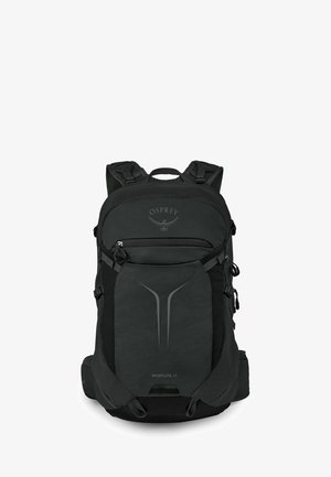 Sac à dos noir Osprey Sportlite 25 avec plusieurs compartiments, bretelles rembourrées et poches latérales en mesh.