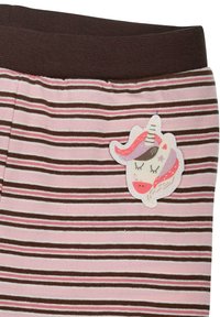 Striped fabric in pink and brown with a unicorn patch. The design features alternating colors and a soft texture. Accents include a unicorn with colorful mane.