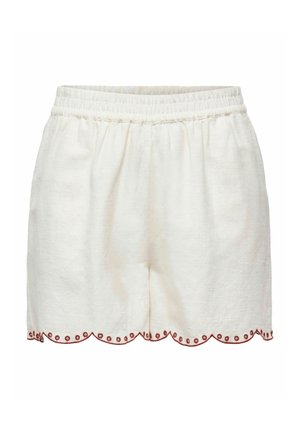 Pantalones cortos de algodón crema con una cinturilla elástica, con un dobladillo en forma de ola acentuado por un borde rojo y pequeños detalles de ojales.