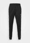 Pantalon de survêtement - black/white