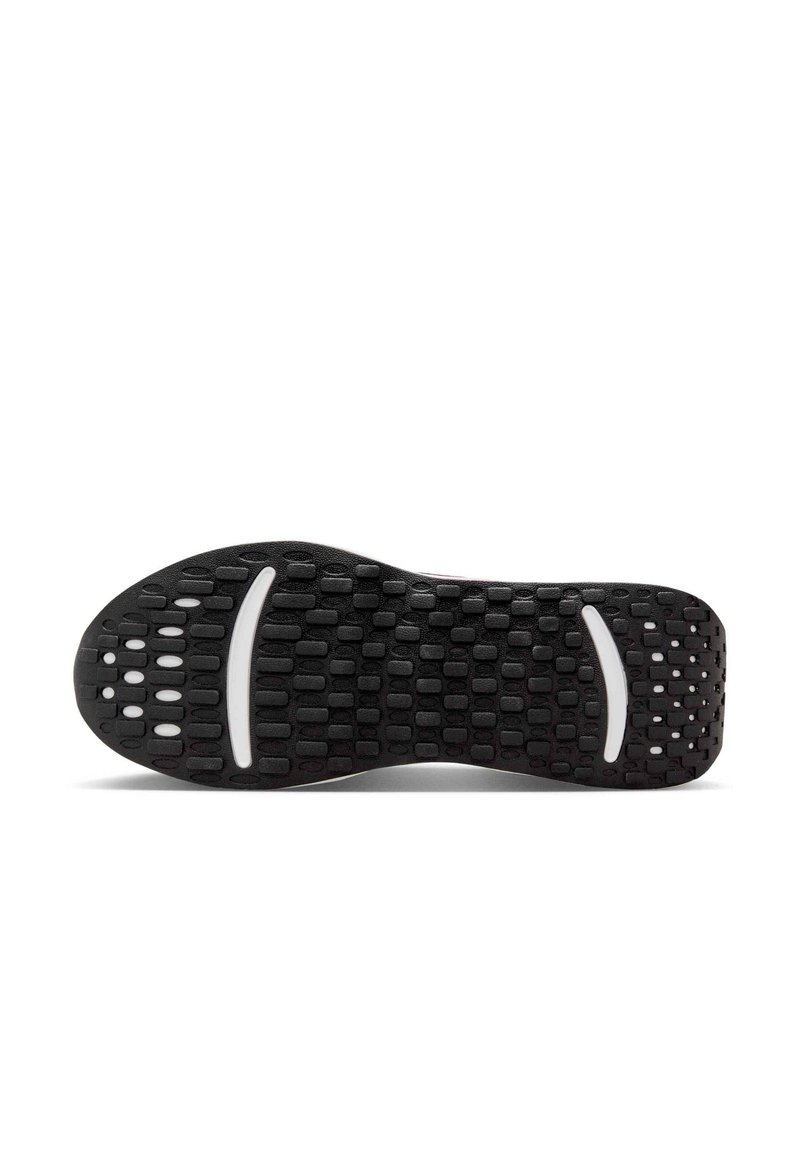 Semelle de chaussure en caoutchouc noir avec une surface texturée, présentant des motifs de prise circulaires et rectangulaires, et une bande accentuée blanche.