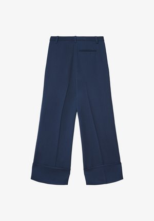 Pantaloni a gamba larga blu navy realizzati in tessuto strutturato, con polsino sagomato, fronte piatto e una tasca singola sul retro.