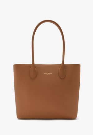Brown leather tote bag with two rounded handles, a textured surface, and a gold embossed logo in the center. Minimalist design, no additional accents.