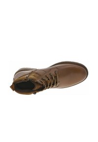 Bottine en cuir brun avec six œillets, bout arrondi et tige texturée en brun. Inclut une fermeture éclair sur le côté pour un accès facile.