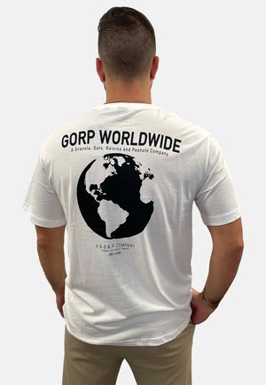 White cotton t-shirt featuring a black world map graphic on the back with "GORP WORLDWIDE" text and a company tagline below.