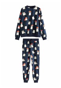 Laivasilta sininen pyjama-asusetti, johon kuuluu collegepaita ja housut, joissa on pingviinikuosi. Pehmeä kangas, ribbatut hihansuut ja juhlalliset punaiset yksityiskohdat pingviinilakeissa.
