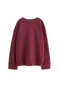 Burgundy sweatshirt, avslappnad passform, mjuk textur, ribbat rundhals, sänkta axlar, elastiska ärmslut och nederkant, slät tyg utan mönster.