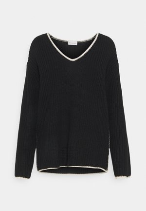 Mustat neuleet takki pitkät hihat ja V-pääntie. Ominaisuudet kontrastivärinen kerma trimmi kauluksessa ja helmassa. Rentoa istuvuutta.