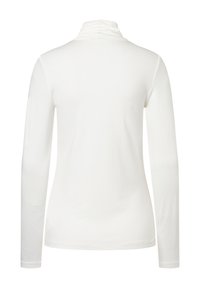 Weiße Langarm-Turtleneck-Bluse aus weichem Stoff. Verfügt über einen hohen Kragen und ein tailliertes Design mit glatter Textur und ohne sichtbare Muster.