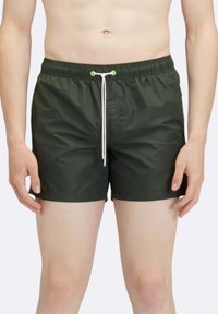 Costumi da bagno verde scuro con cintura elastica, cordino bianco e texture morbida, resistente all'acqua.