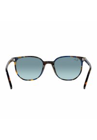 Occhiali da sole tartarugati con montatura rotonda e lenti blu. Caratteristiche includono tempie nere sottili con un accento in acciaio inossidabile.