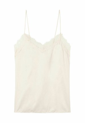 Camisole crème avec des bordures en dentelle au niveau du cou et des bretelles, fabriquée en tissu doux avec une texture lisse, présentant une coupe légèrement ample.