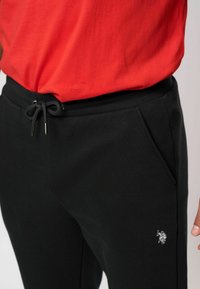 U.S. Polo Assn. Treniņtērpa apakšdaļas - black