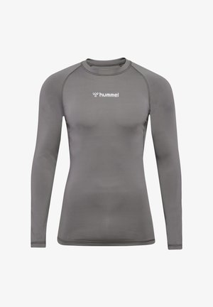 Langærmet træningsshirt i gråt stof med en tætsiddende pasform, rund halsudskæring og hvidt "hummel"-logo på fronten. Glat tekstur.