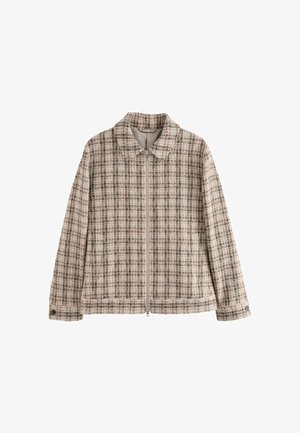 Lättviktig rutig jacka i beige, bruna och svarta nyanser. Har dragkedja framtill, krage och långa ärmar med knäppta manschetter.