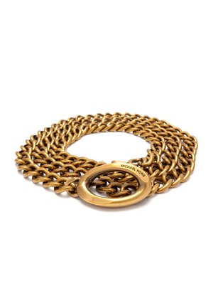 Gold chain belt with interlocking links, featuring a smooth oval buckle with the engraved text "MICHAEL KORS." Shiny, metallic finish.
