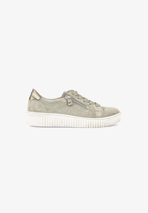 Light green suede sneaker with a textured white sole, rounded toe, and a side zipper detail, featuring metallic accents on the heel.