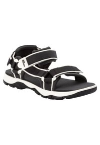 Schwarze verstellbare Sandalen mit weißen Akzenten, ausgestattet mit einer gepolsterten Sohle, sicheren Riemen und einem konturierten Fußbett, das für Komfort sorgt.
