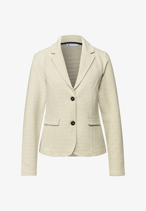 Kremowa marynarka o fakturowanej powierzchni, z kołnierzem z wycięciami, dwoma przednimi kieszeniami i czarnymi guzikami. Podszewka z tkaniny w paski dla kontrastu.
