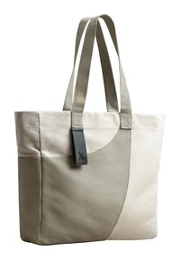 Borsa tote in tela color crema e verde chiaro. Presenta due manici robusti e una texture liscia con un elemento di design curvo su un lato.