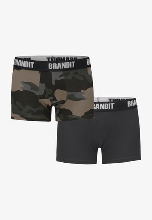 Two pairs of men's boxers: one in a green and brown camouflage pattern, the other solid black. Both have a branded elastic waistband.