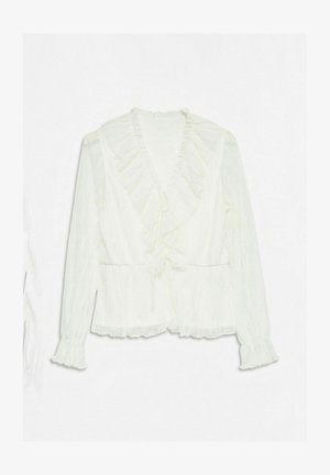 Biała bluzka z długim rękawem, z falbankowym kołnierzykiem, zawiązywana z przodu, z teksturowanej tkaniny, z falbankami na mankietach i u dołu.