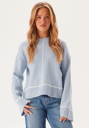 Striktrøje - light blue denim