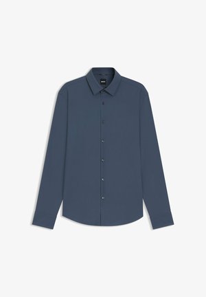 Men’s long-sleeve dark blue button-up shirt with collar, seven front buttons, and cuffed sleeves, laid flat on a white background.