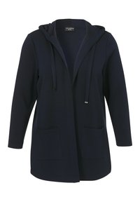 Navy blauwe hoodie cardigan met lange mouwen, open voorkant, twee voorzakken, verstelbare trekkoord en zachte textuur.