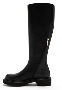 Black knee-high boot made from smooth leather, featuring a side zipper and a chunky sole with textured tread for grip.