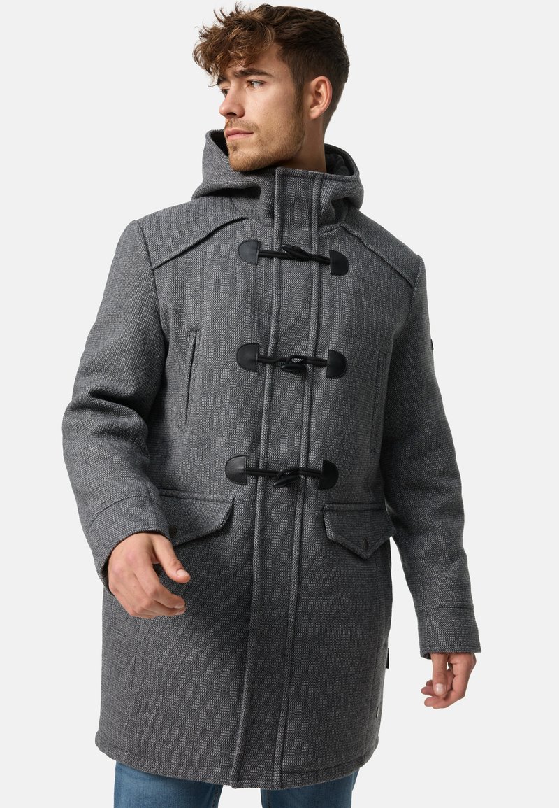 Gray hooded coat in textured fabric, featuring a toggle closure, two front pockets, and a relaxed fit. Long sleeves with a stylish collar.