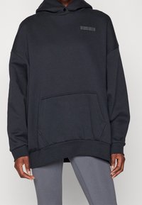 Under Armour Felpa con cappuccio - black