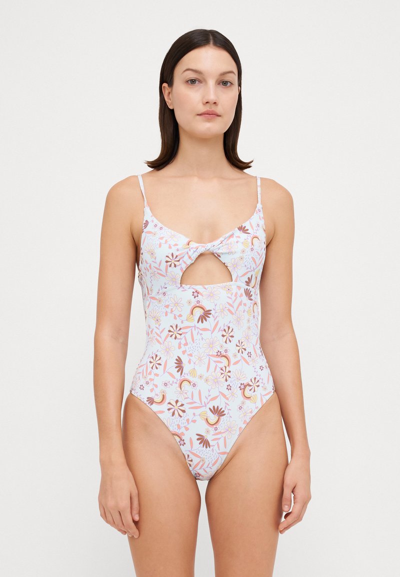 Maillot de bain une pièce avec un motif floral aux couleurs pastel, un détail découpé à l'avant et des bretelles spaghetti réglables.