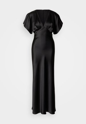 Svart satengkjole med dyp V-utringning og korte, draperte ermer. Tettsittende overdel som går over i et flytende skjørt som rekker til ankelen. Glatt tekstur.