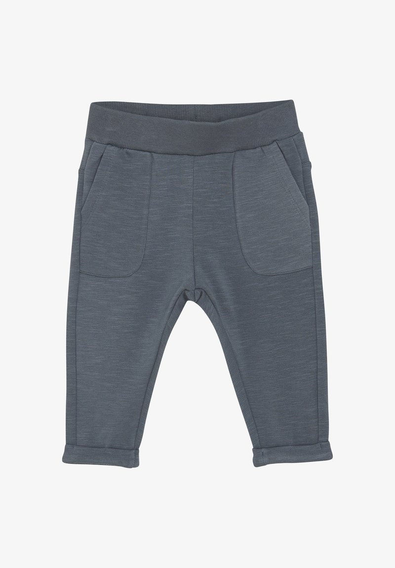 Pantalon de jogging gris en tissu doux avec une taille élastique, doté de deux poches avant et de poignets roulés. Texture lisse avec un motif subtil.