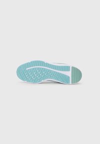 Soletta della scarpa con un design in gomma texturizzata di colore verde menta e bianco, dotata di scanalature per una migliore aderenza. Bordo liscio e design del tacco rotondo.