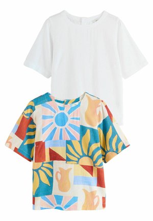 Two short-sleeved tops. One is solid white, the other features a multicolored geometric pattern with sun, pitcher, and sunburst designs.