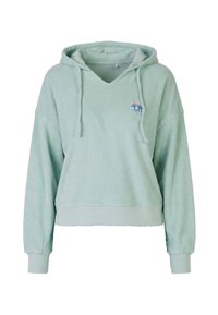 Sweat à capuche en peluche vert clair avec cordons, manches longues, poignets et ourlet côtelés, et petite écusson coloré sur le côté gauche de la poitrine.