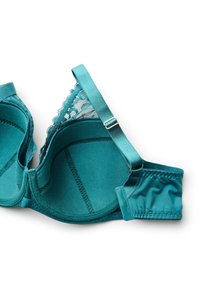 Reggiseno con ferretti verde acqua, dettagli in pizzo sui bordi delle coppe, spalline regolabili e fascia in tessuto liscio su sfondo bianco.