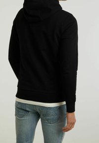 CHASIN' Jersey con capucha - black